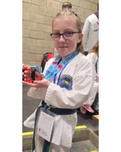 Seren Price with Gold Medal from the Flanders International Taekwondo Tournament in Belgium on the 7TH February 2026